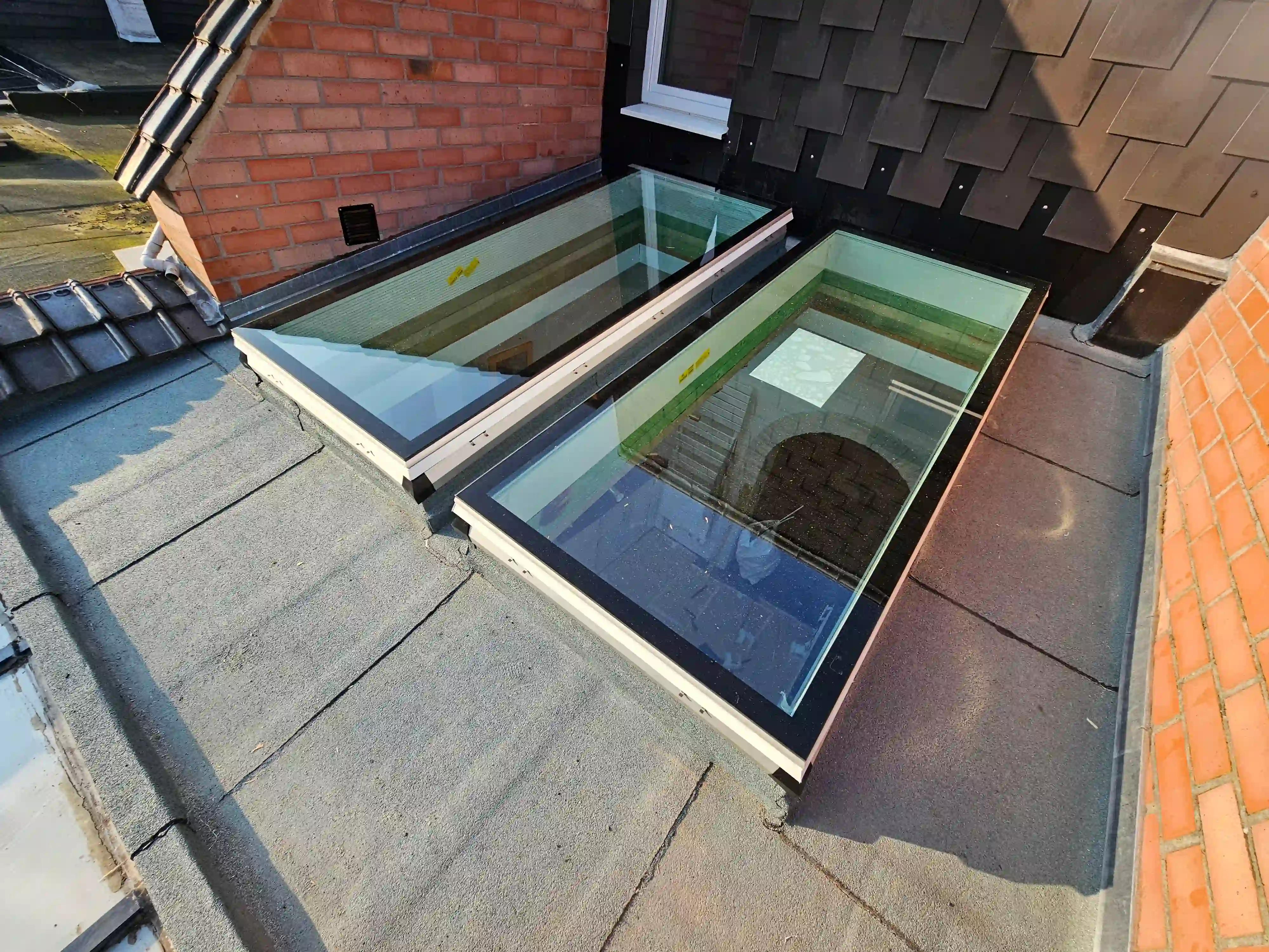 Dakwerken met roofing voor plat dak in Mechelen met Skylux iWindow 2